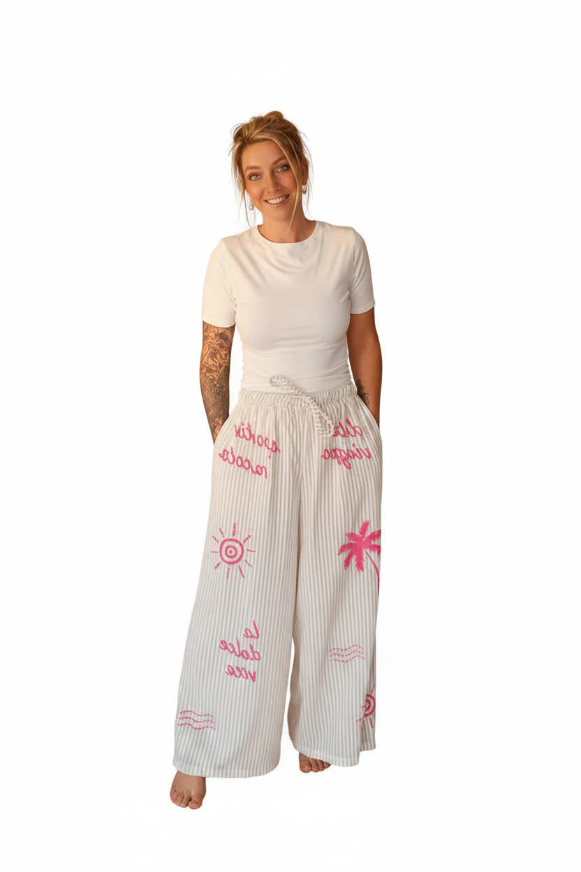 Boho-Luxe weiße Leinenhose mit rosa Streifen und sommerlichen Prints.