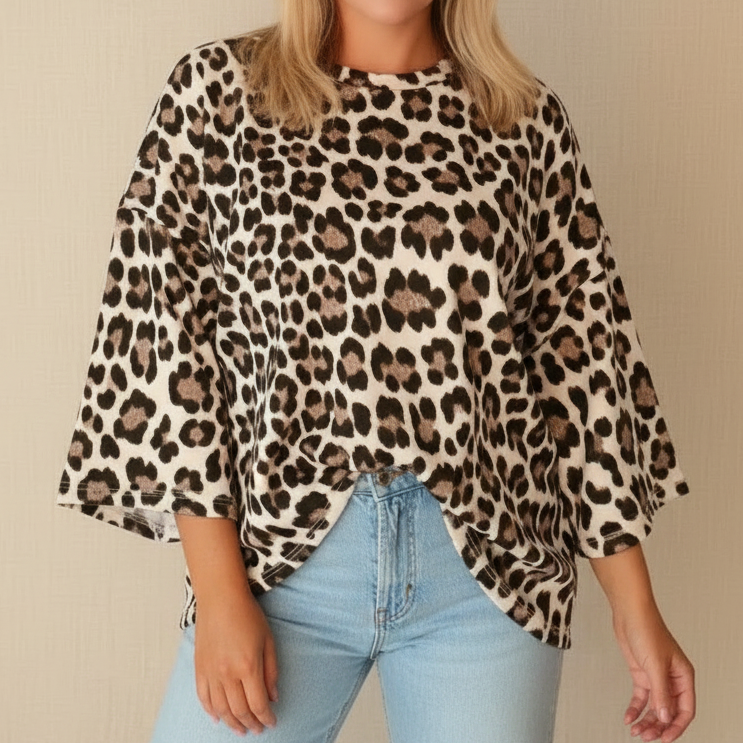 Boho-Luxe Damenoberteil mit Leopardenmuster aus weichem Stoff in Beige und Schwarz.