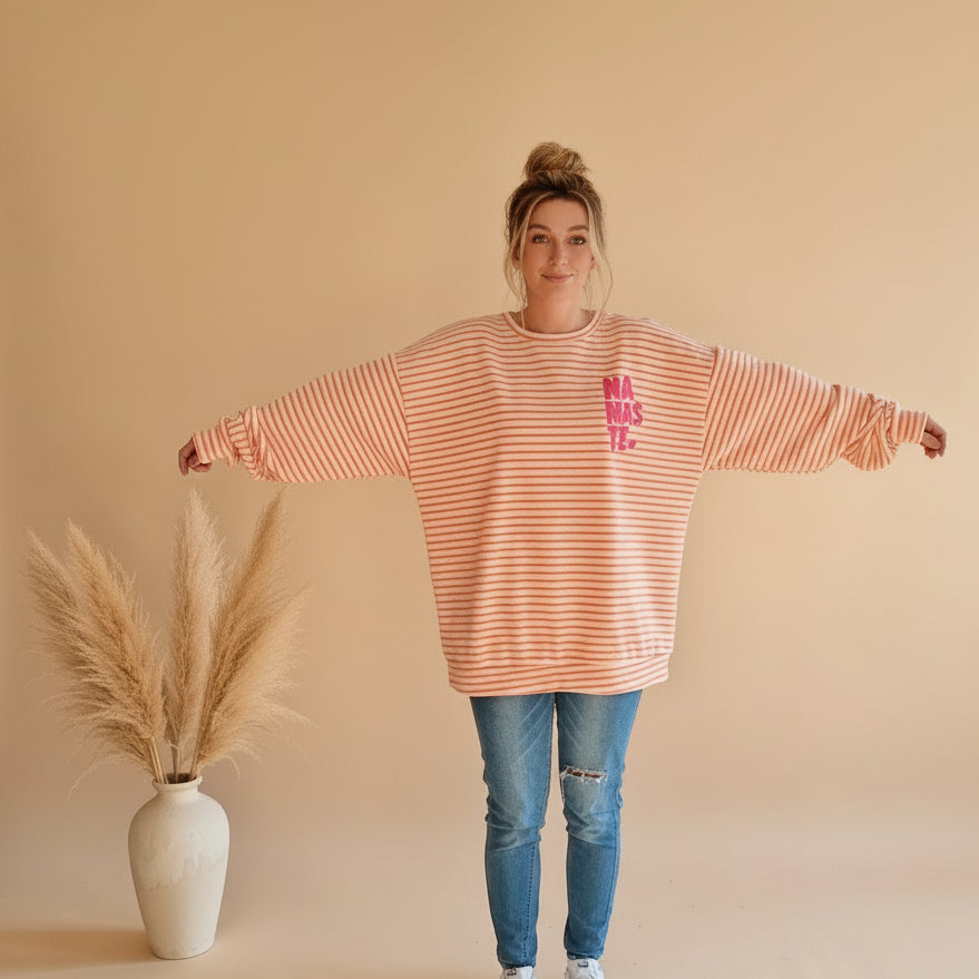 Damen-Sweatshirt in Peach-Weiß mit Streifen, Rundhalsausschnitt und weit geschnittenen Ärmeln