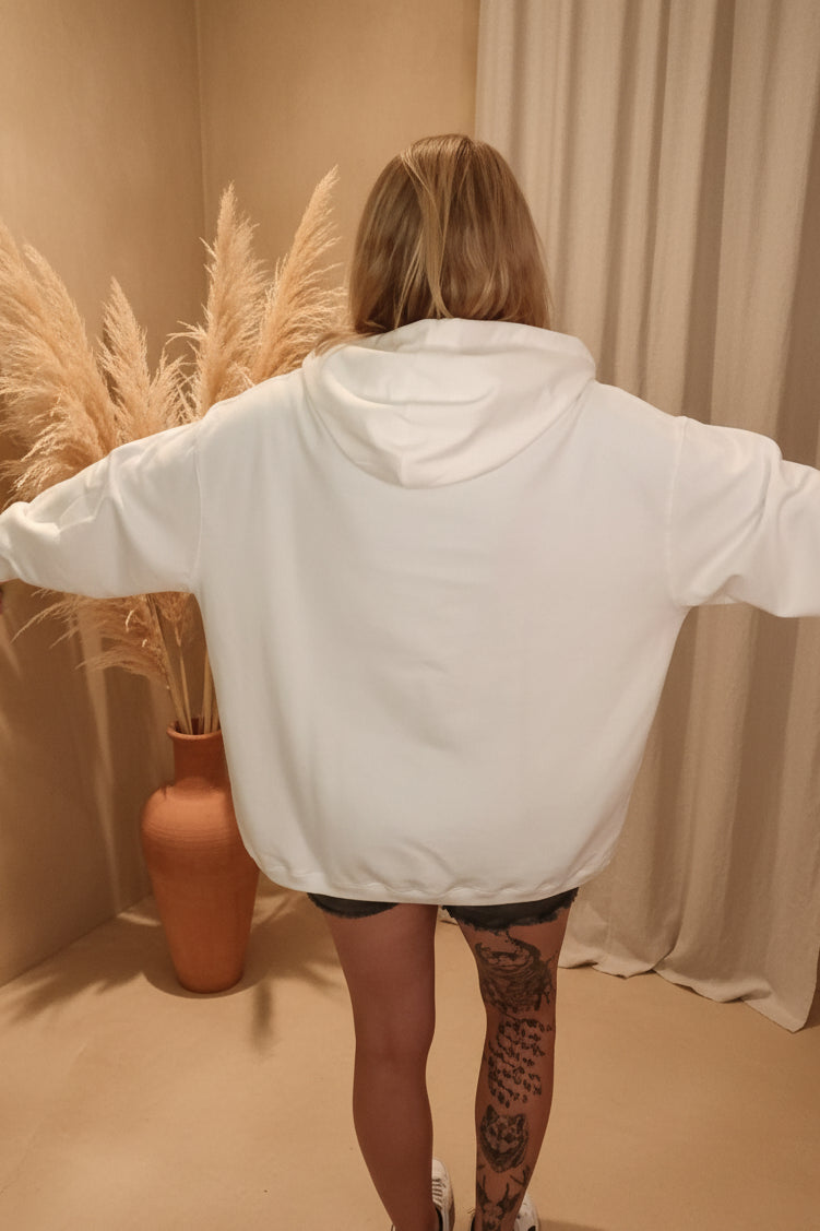 Glitzer Hoodie Damen weiß Frontansicht Nahaufnahme Motiv – RO$E Comic-Ente Glitzer Dollarzeichen