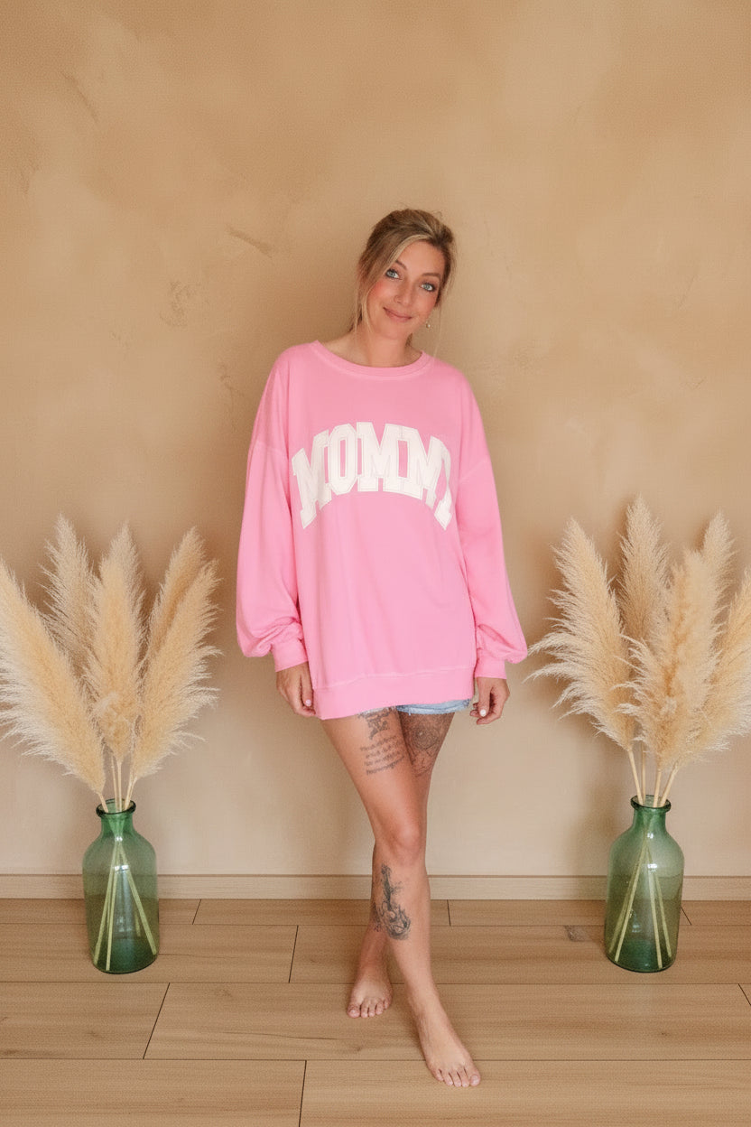 Rosa Boho-Luxe Oversize-Sweatshirt mit weißem Print für Damen.