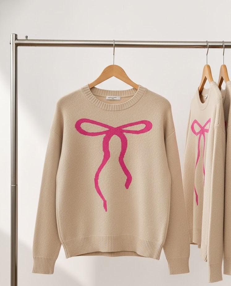 Der Charme in Rosa: Dein neuer Lieblingspullover mit Schleife